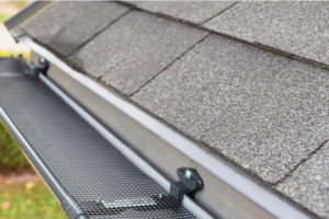 Why Wildwood Homes With Heavy Tree Cover Need Gutter Guards Before Storm Season